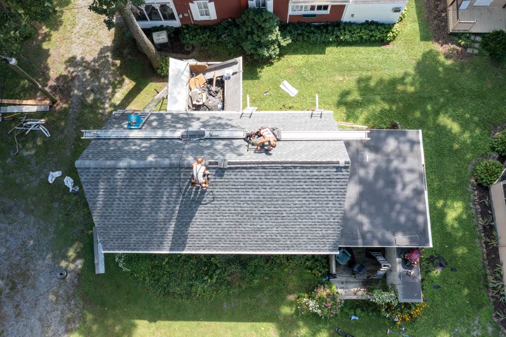 men working on a roof